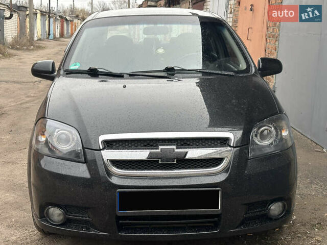 Черный Шевроле Авео, объемом двигателя 1.4 л и пробегом 216 тыс. км за 4500 $, фото 1 на Automoto.ua