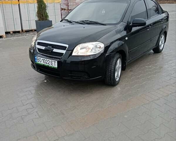Черный Шевроле Авео, объемом двигателя 1.5 л и пробегом 180 тыс. км за 3350 $, фото 1 на Automoto.ua