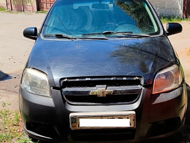 Черный Шевроле Авео, объемом двигателя 1.5 л и пробегом 350 тыс. км за 1500 $, фото 1 на Automoto.ua
