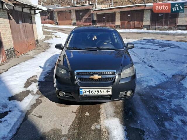 Черный Шевроле Авео, объемом двигателя 1.5 л и пробегом 265 тыс. км за 4000 $, фото 1 на Automoto.ua