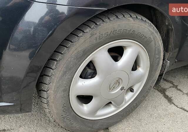 Черный Шевроле Авео, объемом двигателя 1.5 л и пробегом 136 тыс. км за 4100 $, фото 1 на Automoto.ua