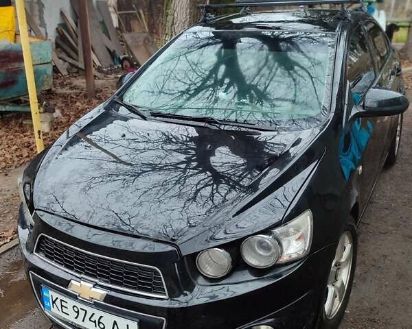 Черный Шевроле Авео, объемом двигателя 1.6 л и пробегом 187 тыс. км за 4200 $, фото 1 на Automoto.ua