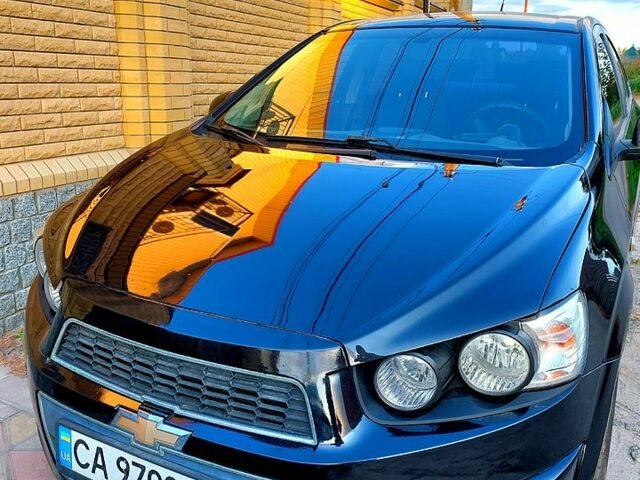 Черный Шевроле Авео, объемом двигателя 1.6 л и пробегом 155 тыс. км за 4600 $, фото 1 на Automoto.ua