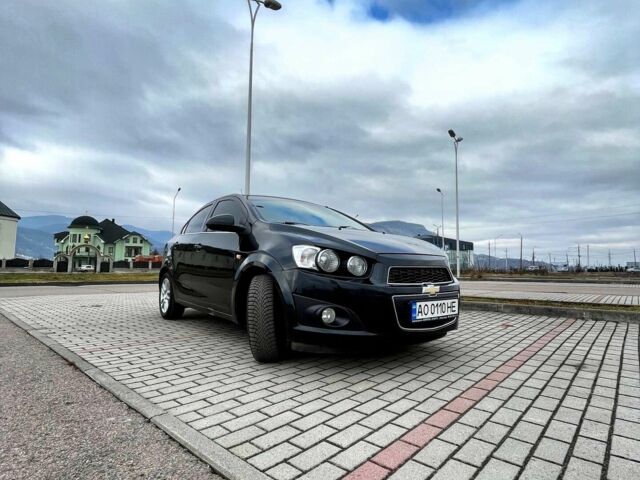Черный Шевроле Авео, объемом двигателя 1.6 л и пробегом 170 тыс. км за 6100 $, фото 1 на Automoto.ua