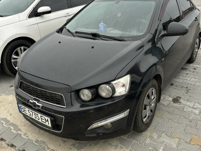Черный Шевроле Авео, объемом двигателя 1.6 л и пробегом 161 тыс. км за 6200 $, фото 1 на Automoto.ua