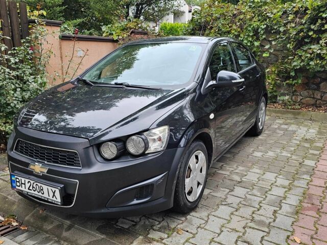 Черный Шевроле Авео, объемом двигателя 1.4 л и пробегом 98 тыс. км за 5500 $, фото 1 на Automoto.ua