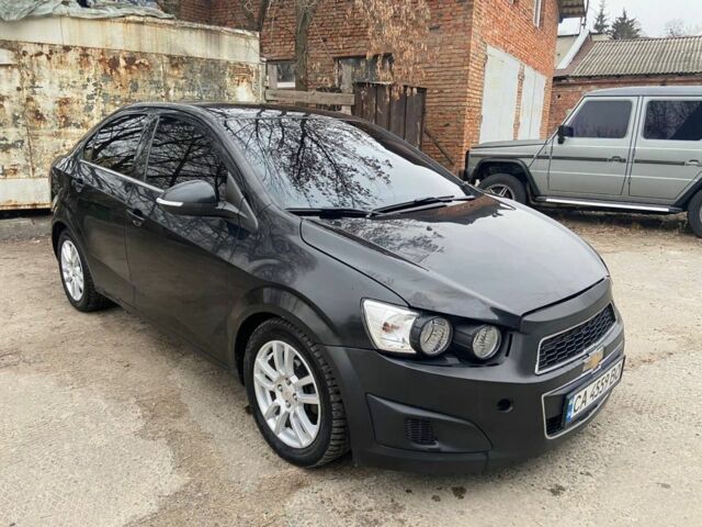 Черный Шевроле Авео, объемом двигателя 1.4 л и пробегом 172 тыс. км за 3100 $, фото 1 на Automoto.ua