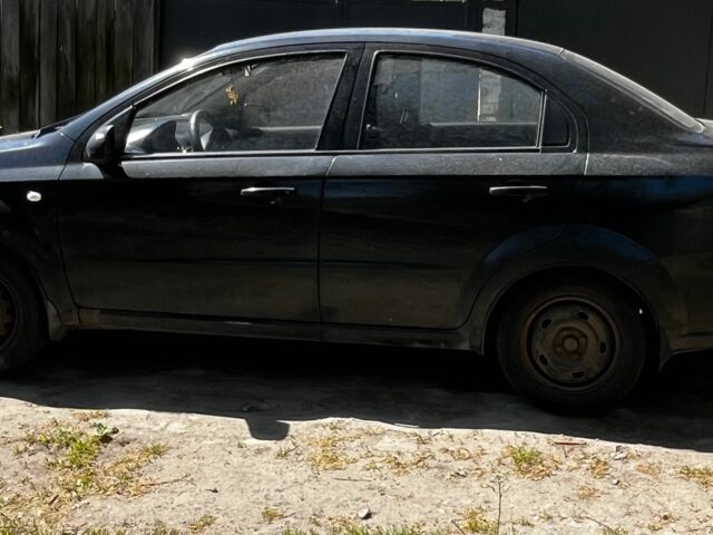 Черный Шевроле Авео, объемом двигателя 1.5 л и пробегом 300 тыс. км за 2100 $, фото 1 на Automoto.ua