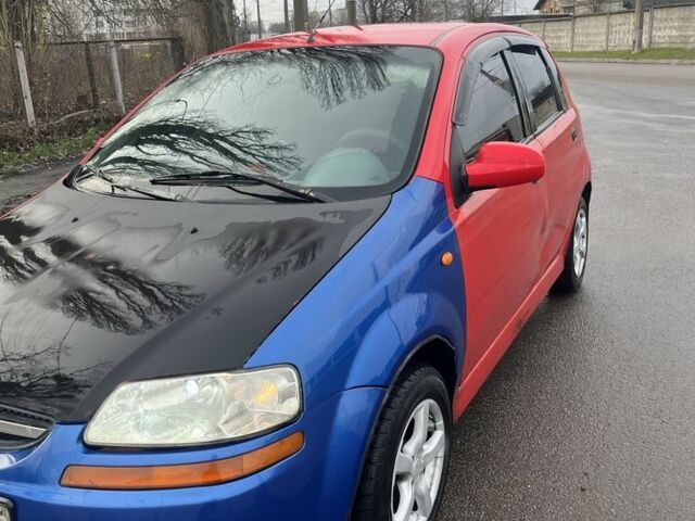 Красный Шевроле Авео, объемом двигателя 1.5 л и пробегом 400 тыс. км за 2400 $, фото 1 на Automoto.ua