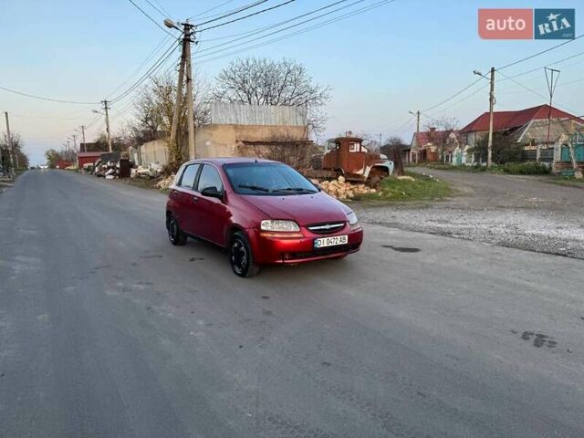 Красный Шевроле Авео, объемом двигателя 1.5 л и пробегом 306 тыс. км за 2000 $, фото 1 на Automoto.ua