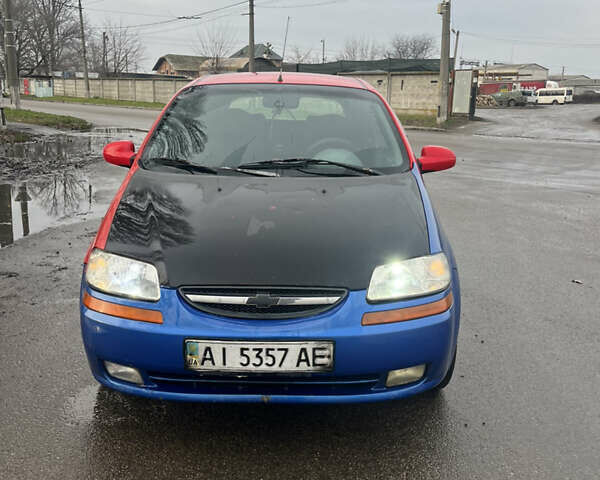 Красный Шевроле Авео, объемом двигателя 1.5 л и пробегом 400 тыс. км за 2400 $, фото 1 на Automoto.ua