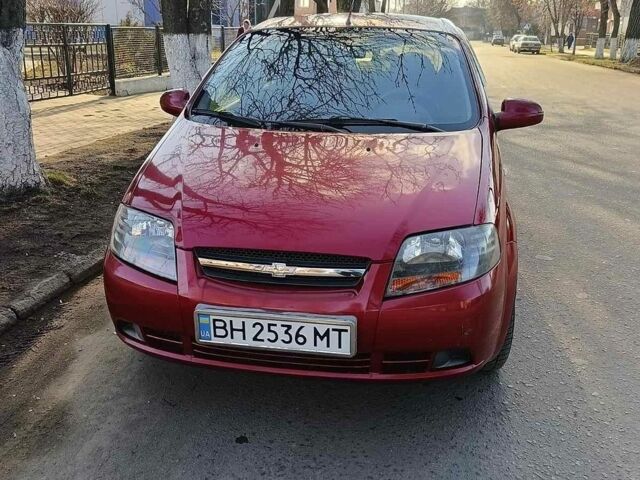 Красный Шевроле Авео, объемом двигателя 1.5 л и пробегом 150 тыс. км за 3800 $, фото 1 на Automoto.ua
