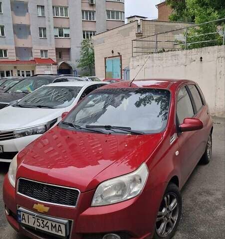 Красный Шевроле Авео, объемом двигателя 1.4 л и пробегом 200 тыс. км за 4400 $, фото 1 на Automoto.ua