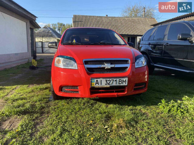 Красный Шевроле Авео, объемом двигателя 1.6 л и пробегом 148 тыс. км за 4650 $, фото 1 на Automoto.ua