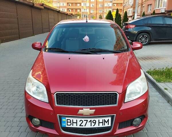 Красный Шевроле Авео, объемом двигателя 1.5 л и пробегом 130 тыс. км за 4800 $, фото 1 на Automoto.ua