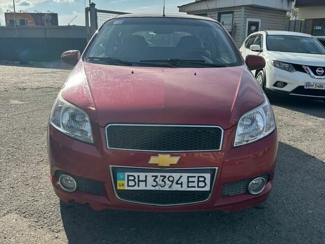 Красный Шевроле Авео, объемом двигателя 1.5 л и пробегом 155 тыс. км за 5500 $, фото 1 на Automoto.ua