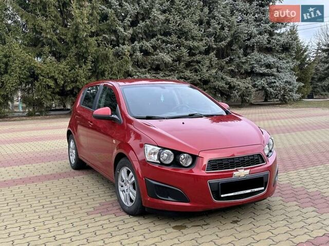 Красный Шевроле Авео, объемом двигателя 1.4 л и пробегом 154 тыс. км за 6200 $, фото 1 на Automoto.ua