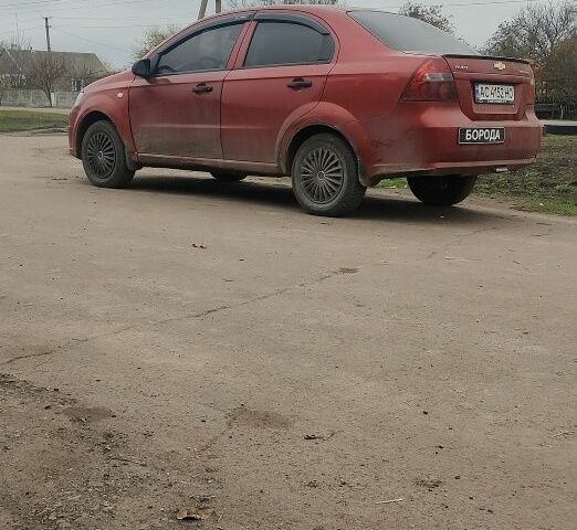 Красный Шевроле Авео, объемом двигателя 1.5 л и пробегом 275 тыс. км за 3000 $, фото 1 на Automoto.ua