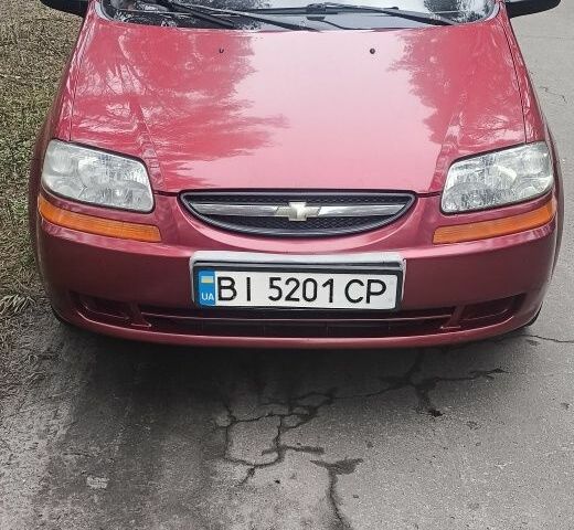 Красный Шевроле Авео, объемом двигателя 1.5 л и пробегом 290 тыс. км за 2250 $, фото 1 на Automoto.ua