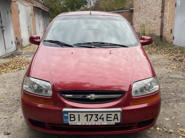 Красный Шевроле Авео, объемом двигателя 1.5 л и пробегом 224 тыс. км за 3200 $, фото 1 на Automoto.ua