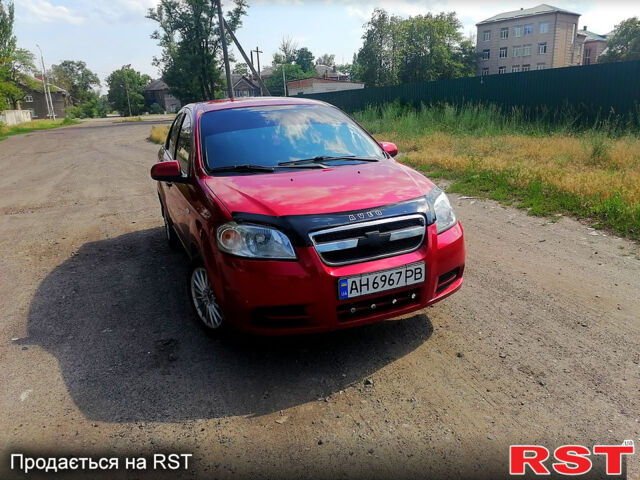 Червоний Шевроле Авео, об'ємом двигуна 1.5 л та пробігом 211 тис. км за 4200 $, фото 1 на Automoto.ua