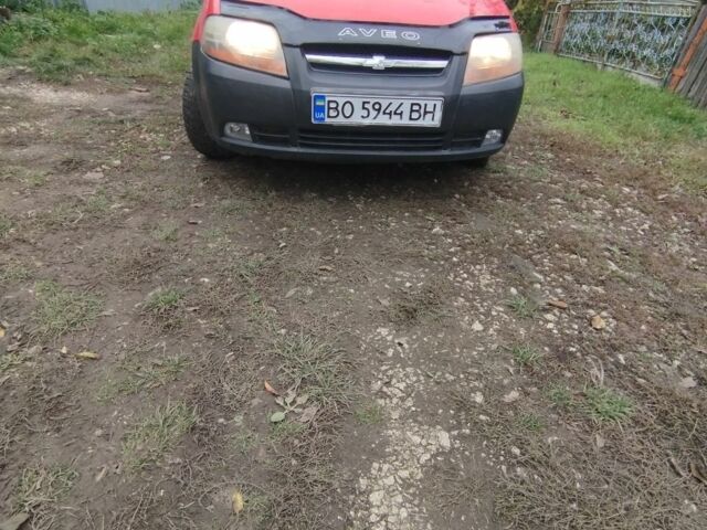 Красный Шевроле Авео, объемом двигателя 1.5 л и пробегом 163 тыс. км за 2100 $, фото 1 на Automoto.ua