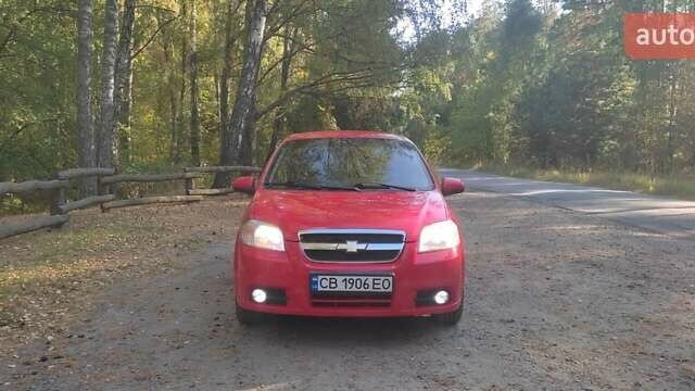 Красный Шевроле Авео, объемом двигателя 1.5 л и пробегом 241 тыс. км за 3500 $, фото 1 на Automoto.ua