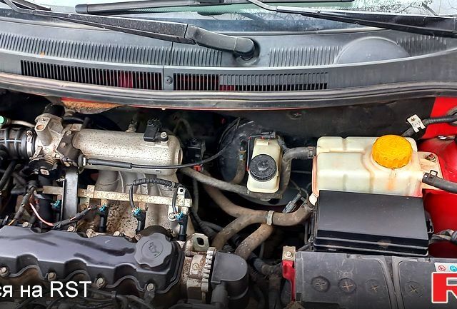 Червоний Шевроле Авео, об'ємом двигуна 1.5 л та пробігом 168 тис. км за 4200 $, фото 1 на Automoto.ua