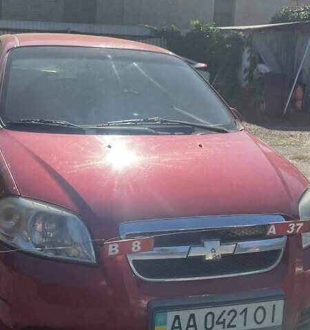 Красный Шевроле Авео, объемом двигателя 1.5 л и пробегом 160 тыс. км за 3800 $, фото 1 на Automoto.ua