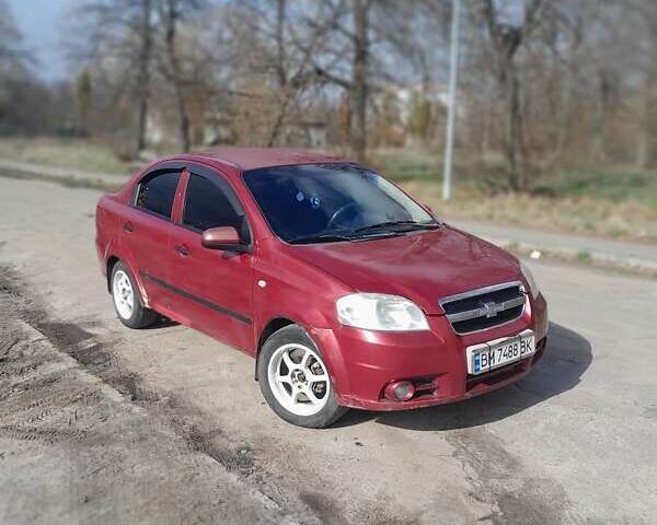 Красный Шевроле Авео, объемом двигателя 1.5 л и пробегом 300 тыс. км за 3000 $, фото 1 на Automoto.ua