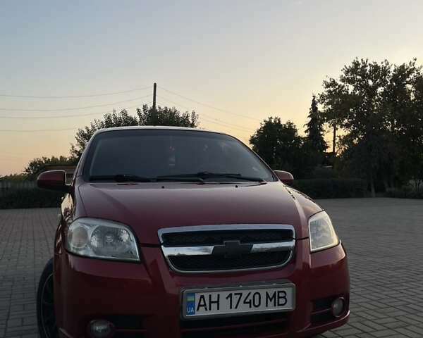 Красный Шевроле Авео, объемом двигателя 1.5 л и пробегом 198 тыс. км за 4000 $, фото 1 на Automoto.ua