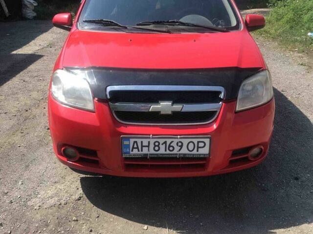 Красный Шевроле Авео, объемом двигателя 1.5 л и пробегом 180 тыс. км за 3800 $, фото 1 на Automoto.ua