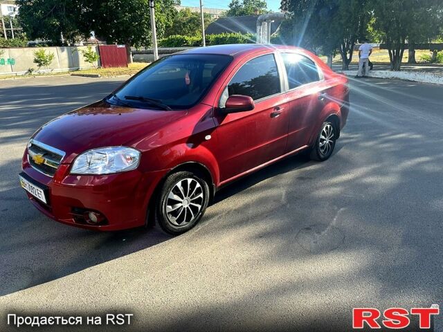 Красный Шевроле Авео, объемом двигателя 1.6 л и пробегом 250 тыс. км за 3500 $, фото 1 на Automoto.ua