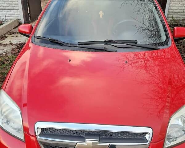 Красный Шевроле Авео, объемом двигателя 1.5 л и пробегом 237 тыс. км за 3600 $, фото 1 на Automoto.ua