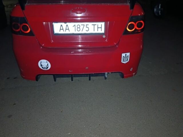 Красный Шевроле Авео, объемом двигателя 1.5 л и пробегом 331 тыс. км за 2700 $, фото 1 на Automoto.ua