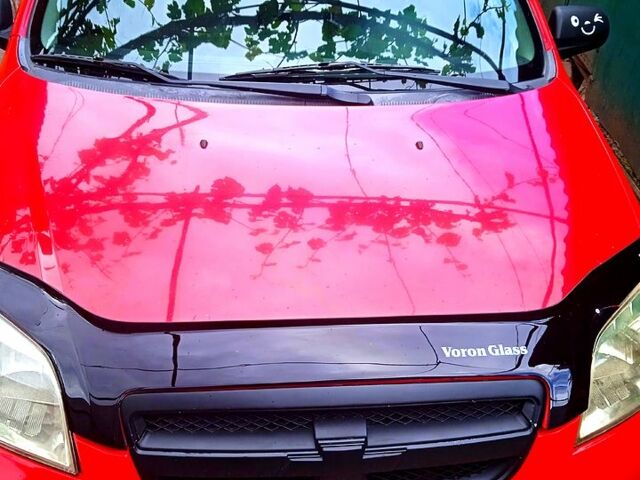Красный Шевроле Авео, объемом двигателя 1.5 л и пробегом 230 тыс. км за 3800 $, фото 1 на Automoto.ua