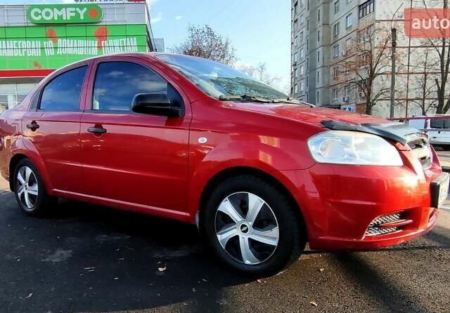Красный Шевроле Авео, объемом двигателя 1.4 л и пробегом 202 тыс. км за 3600 $, фото 1 на Automoto.ua