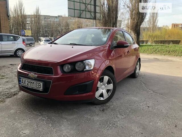 Червоний Шевроле Авео, об'ємом двигуна 1.4 л та пробігом 80 тис. км за 7500 $, фото 1 на Automoto.ua