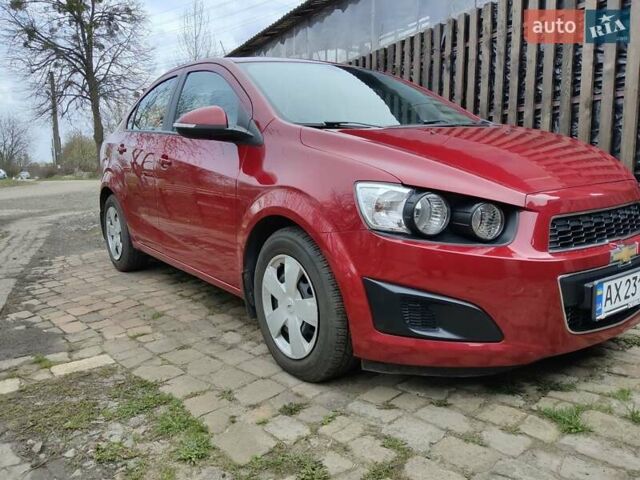 Красный Шевроле Авео, объемом двигателя 1.4 л и пробегом 83 тыс. км за 6600 $, фото 1 на Automoto.ua