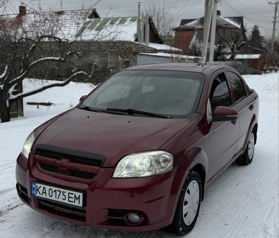 Красный Шевроле Авео, объемом двигателя 1.5 л и пробегом 200 тыс. км за 3599 $, фото 1 на Automoto.ua