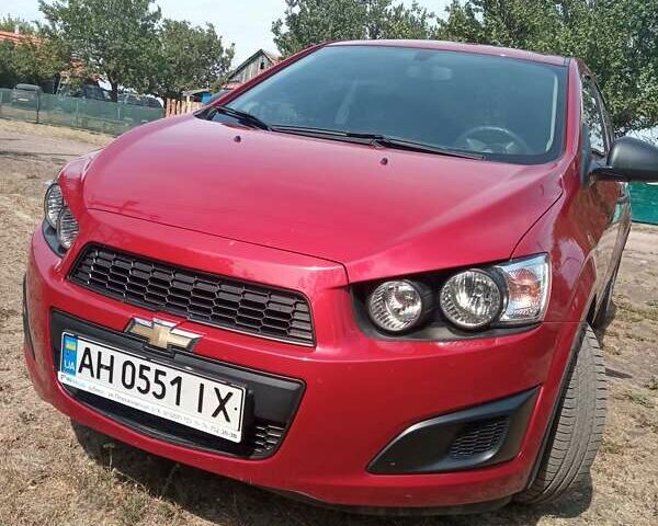 Красный Шевроле Авео, объемом двигателя 1.4 л и пробегом 61 тыс. км за 7300 $, фото 1 на Automoto.ua