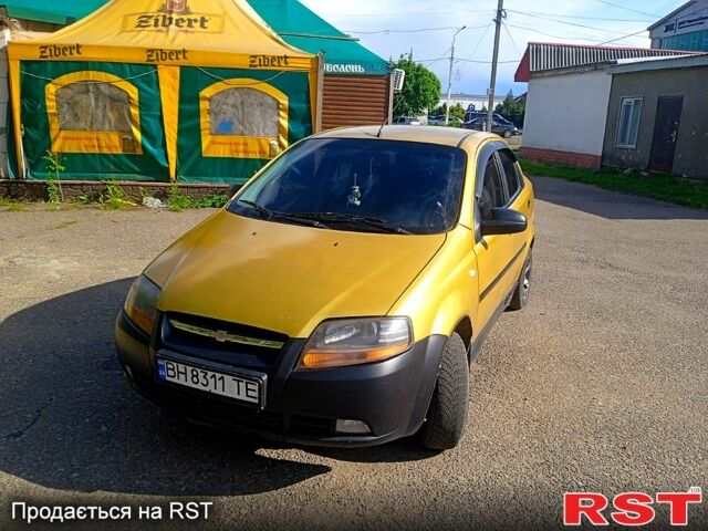 Желтый Шевроле Авео, объемом двигателя 1.5 л и пробегом 270 тыс. км за 2800 $, фото 1 на Automoto.ua