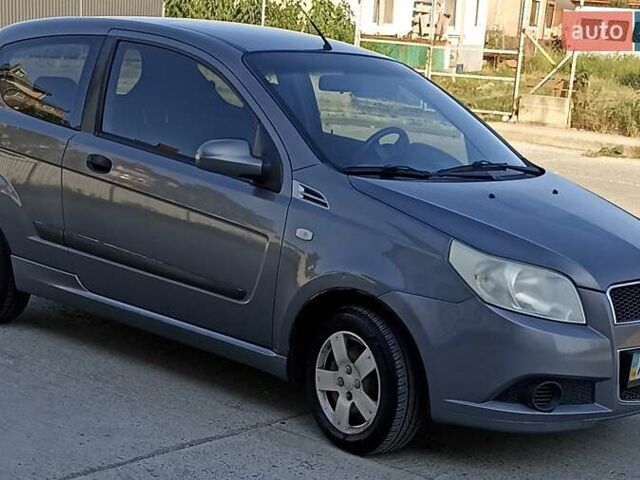 Серый Шевроле Авео, объемом двигателя 1.5 л и пробегом 244 тыс. км за 3950 $, фото 1 на Automoto.ua