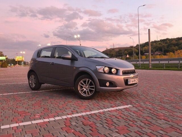 Серый Шевроле Авео, объемом двигателя 1.4 л и пробегом 202 тыс. км за 5500 $, фото 1 на Automoto.ua