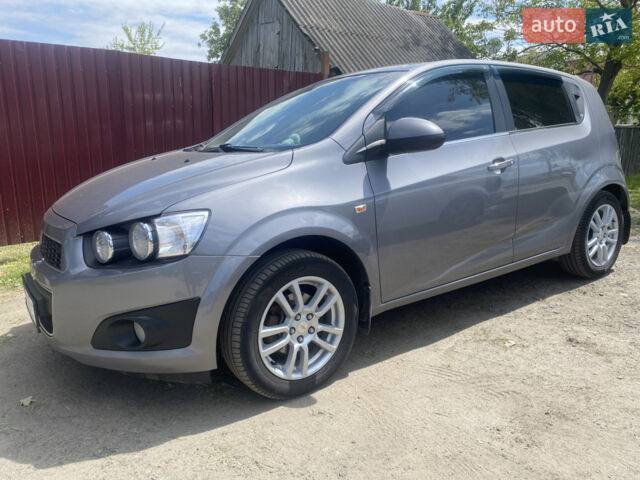 Серый Шевроле Авео, объемом двигателя 1.25 л и пробегом 240 тыс. км за 5600 $, фото 1 на Automoto.ua
