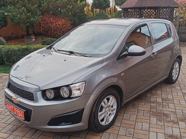 Серый Шевроле Авео, объемом двигателя 1.3 л и пробегом 219 тыс. км за 6000 $, фото 1 на Automoto.ua