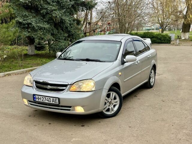 Серый Шевроле Авео, объемом двигателя 1.8 л и пробегом 258 тыс. км за 1500 $, фото 1 на Automoto.ua