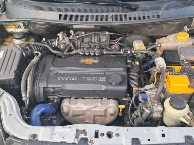Серый Шевроле Авео, объемом двигателя 1.6 л и пробегом 380 тыс. км за 4700 $, фото 1 на Automoto.ua