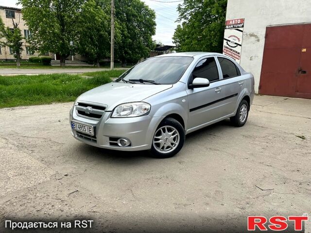 Серый Шевроле Авео, объемом двигателя 1.6 л и пробегом 210 тыс. км за 3800 $, фото 1 на Automoto.ua