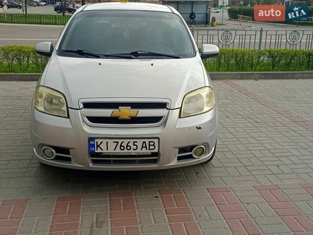 Серый Шевроле Авео, объемом двигателя 1.6 л и пробегом 244 тыс. км за 3500 $, фото 1 на Automoto.ua